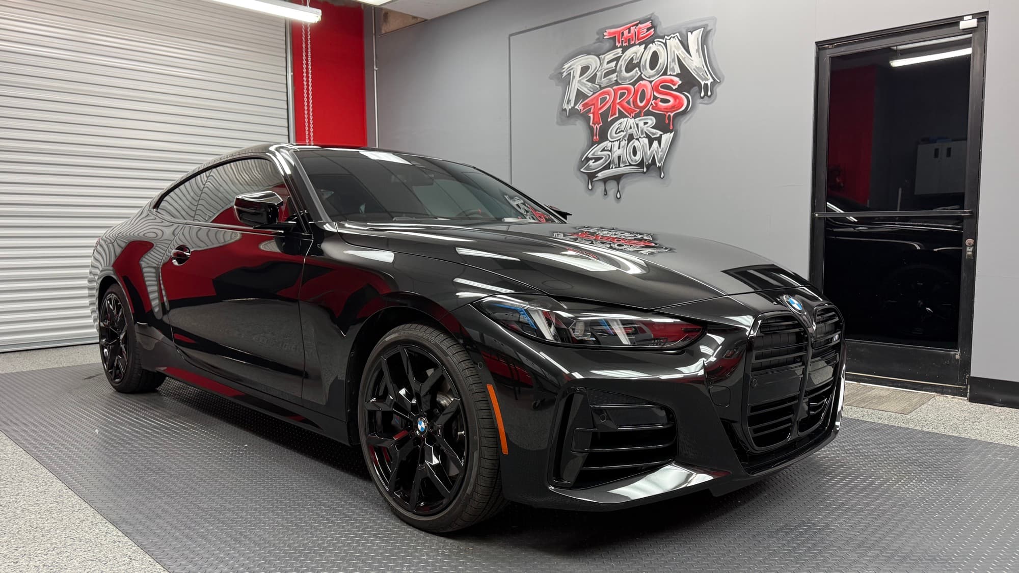 Jet-black 2026 BMW after full paint correction at The Recon Pros Huntington Beach
