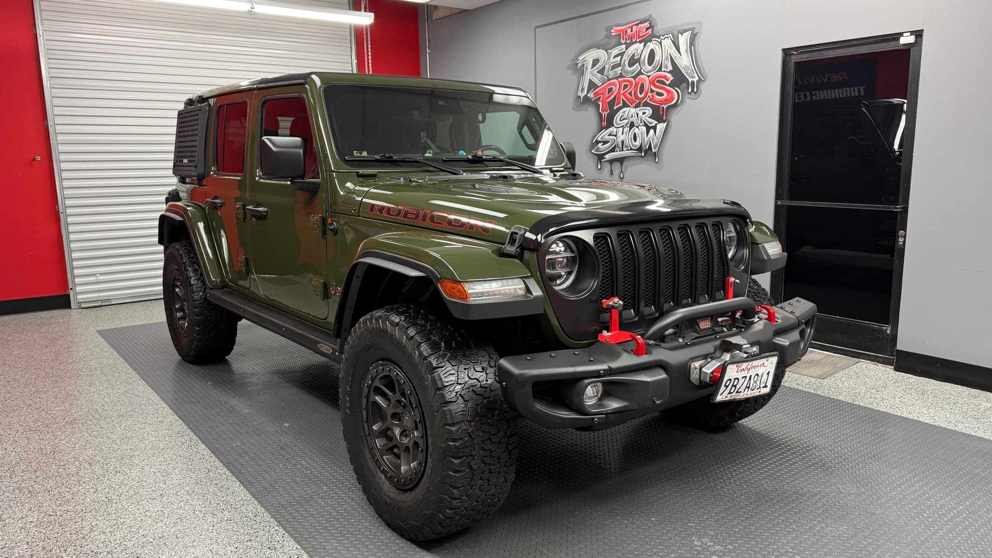 Green Jeep Wrangler Rubicon after wet-sand and wheels-off restoration at The Recon Pros Huntington Beach