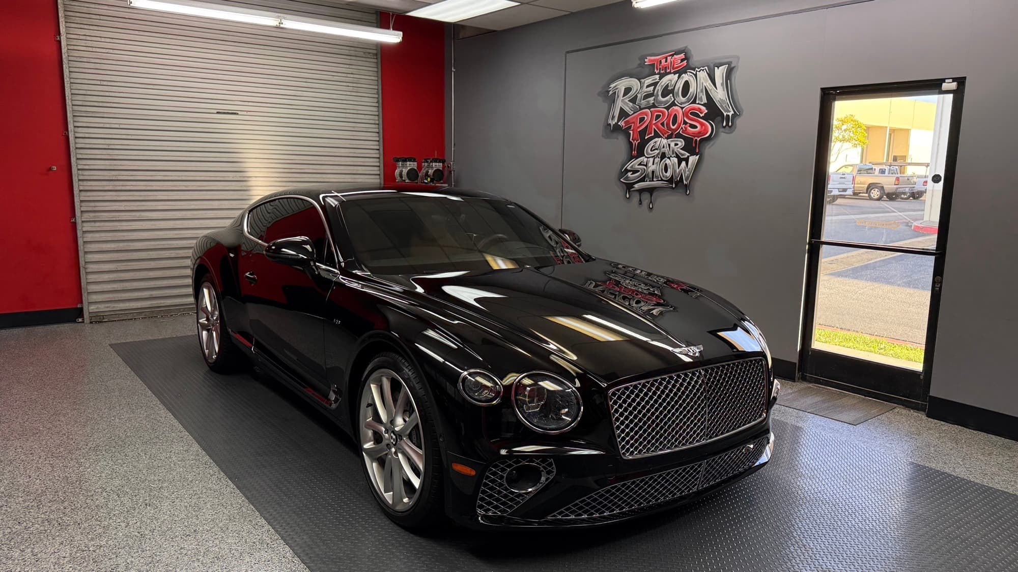 Recent paint correction on black paint at The Recon Pros studio in Huntington Beach