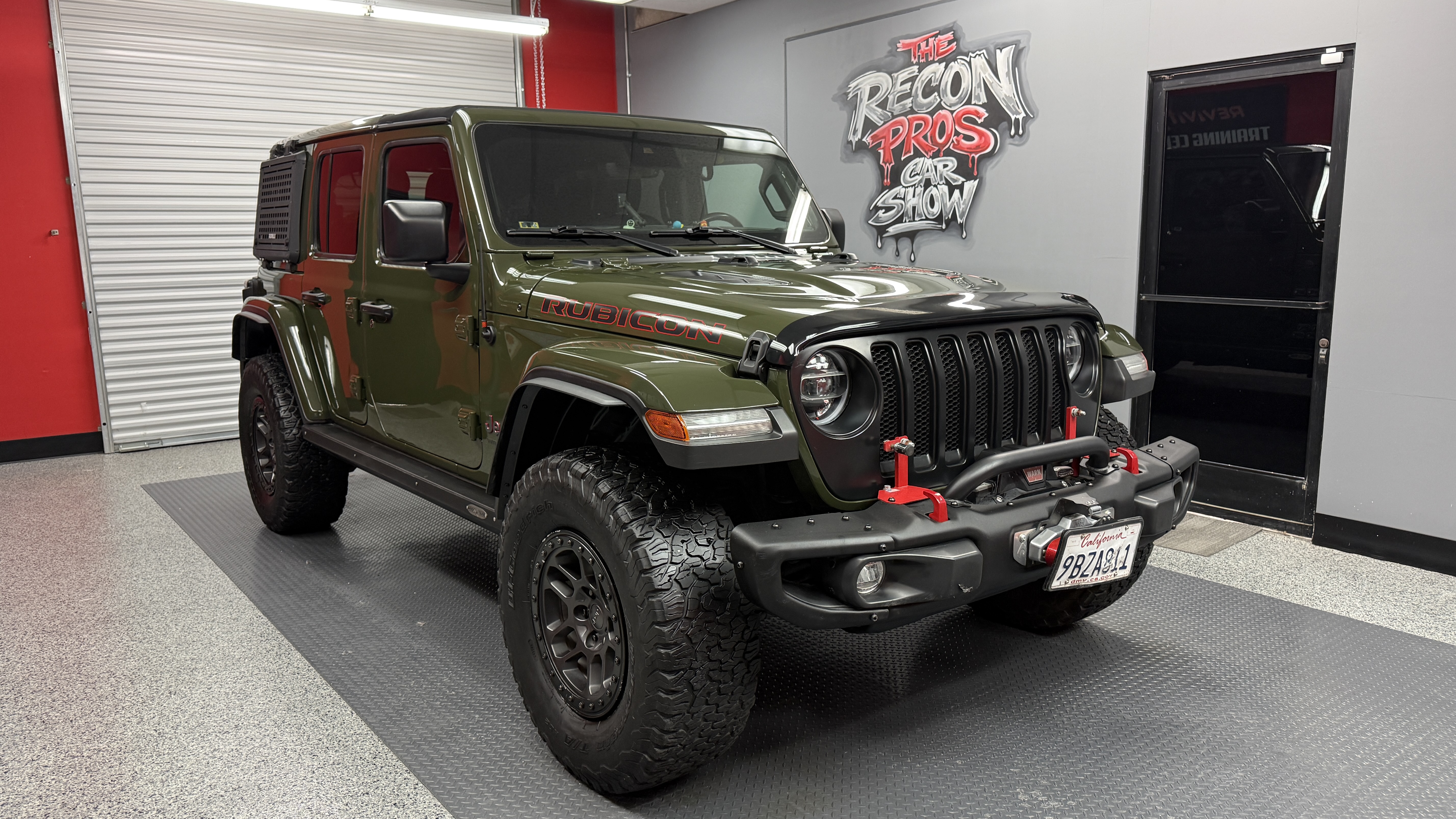 Green Jeep Wrangler Rubicon after wet-sand and wheels-off restoration at The Recon Pros Huntington Beach