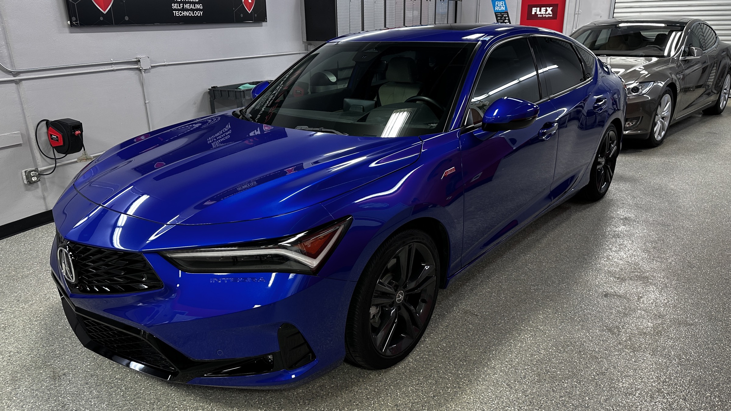 Tesla wheel and caliper detail at The Recon Pros Huntington Beach