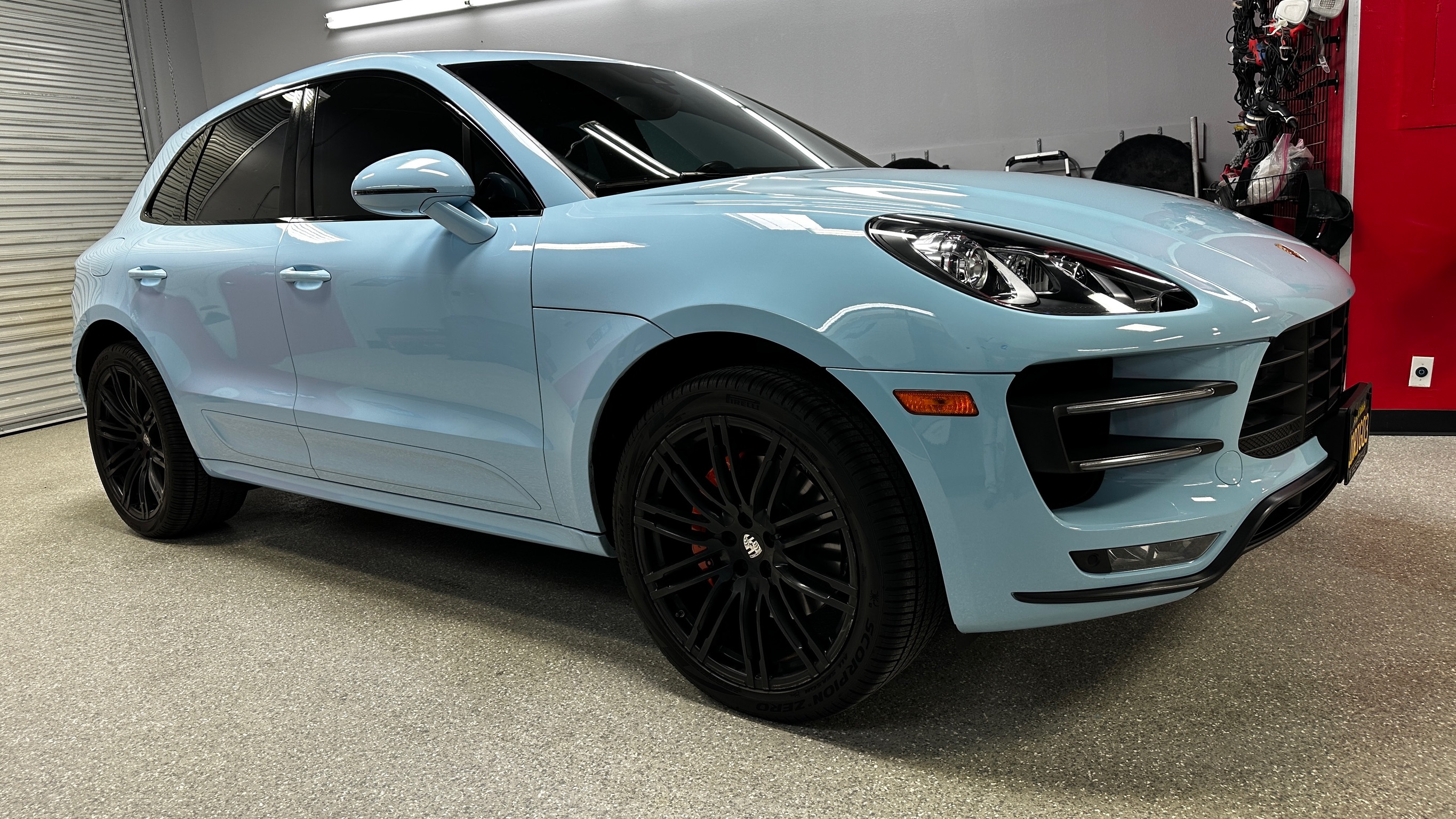 Blue Porsche after multi-stage paint correction at The Recon Pros studio
